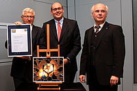 Dr. Michael J. Inacker (centre) and Dr. Thomas A. Seidel (right) from the International Martin Luther Foundation with the awardee of the LutherRose 2011 Dirk Ippen (left)