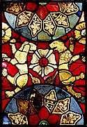 Bild eines Teiles des Löwen- und Papageienfensters mit Löwen und Rose